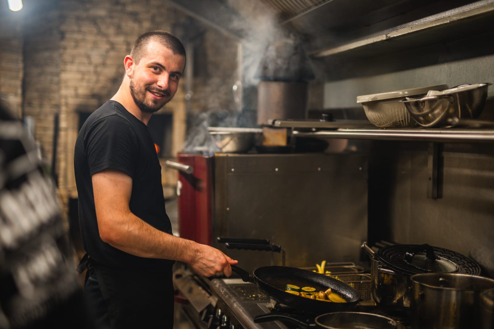Chef working the stove during service