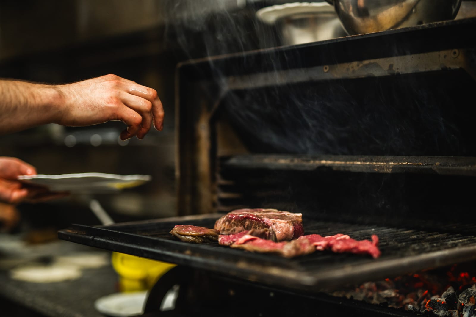 Steak searing on the open grill