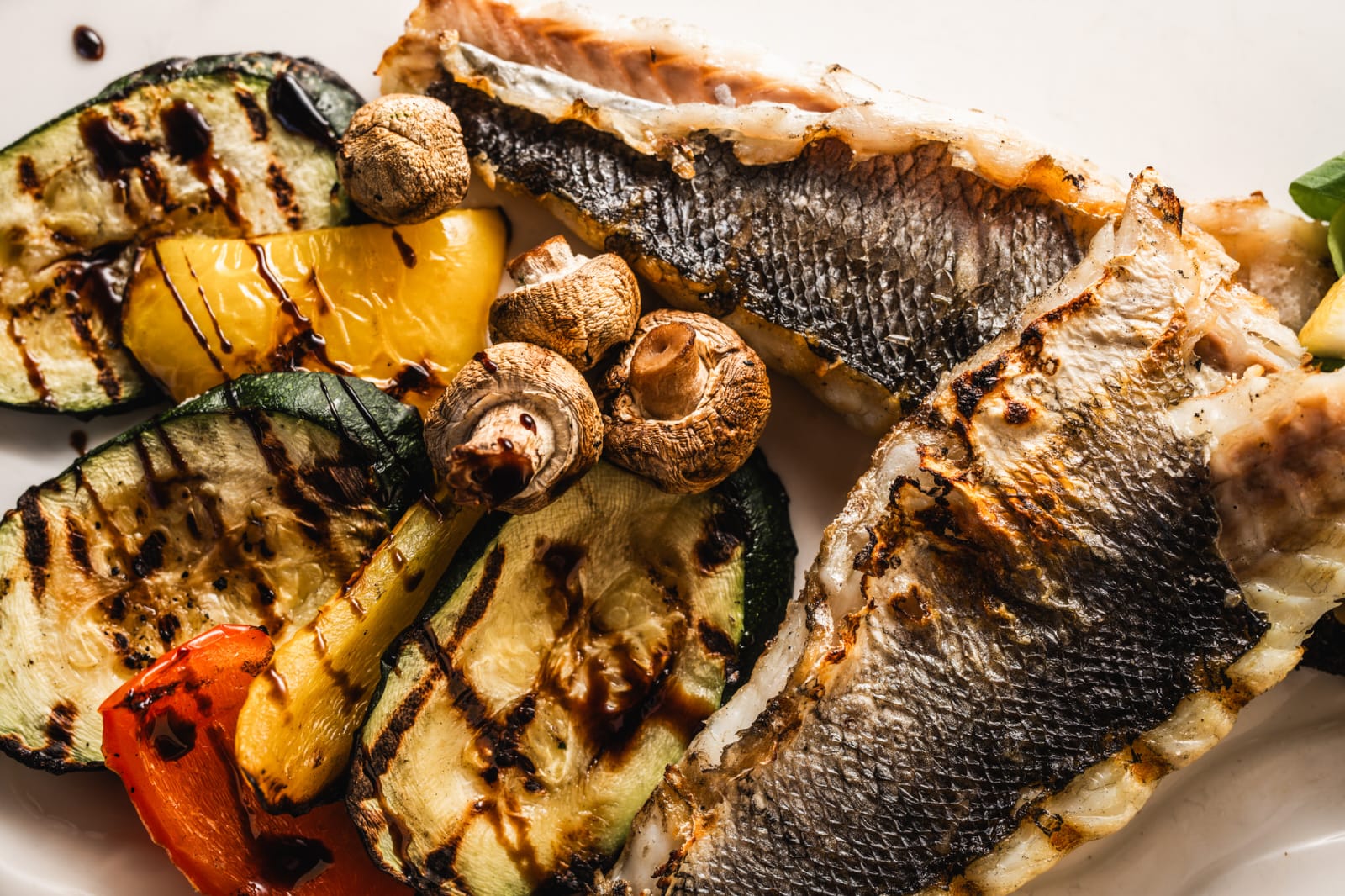 Grilled sea bass with vegetables