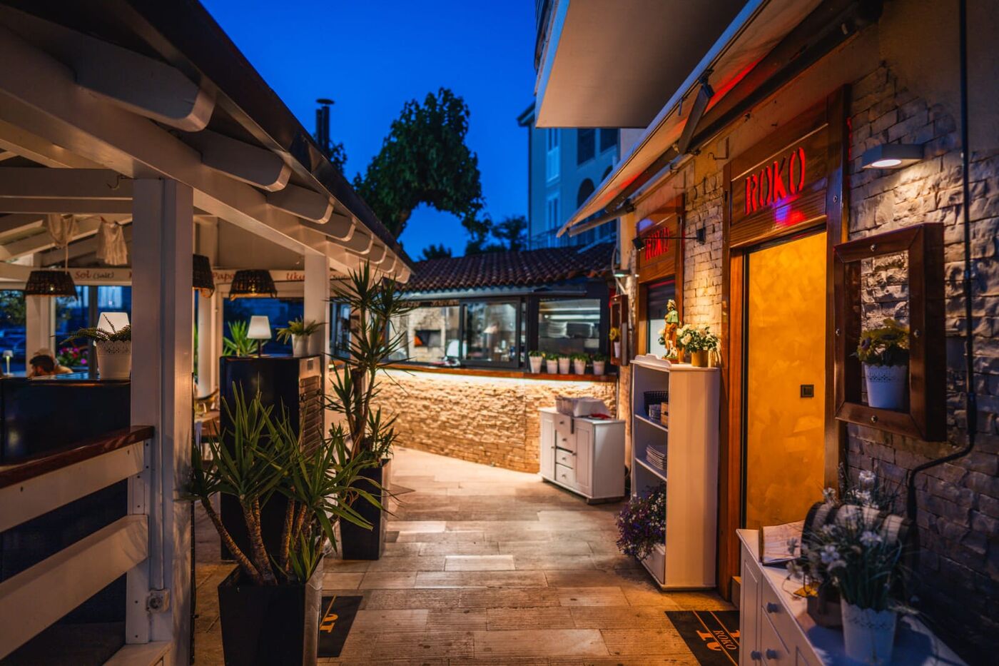 Roko entrance pathway at blue hour